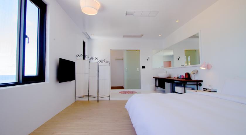 Sea Shore Hotel Manzhou Phòng bức ảnh