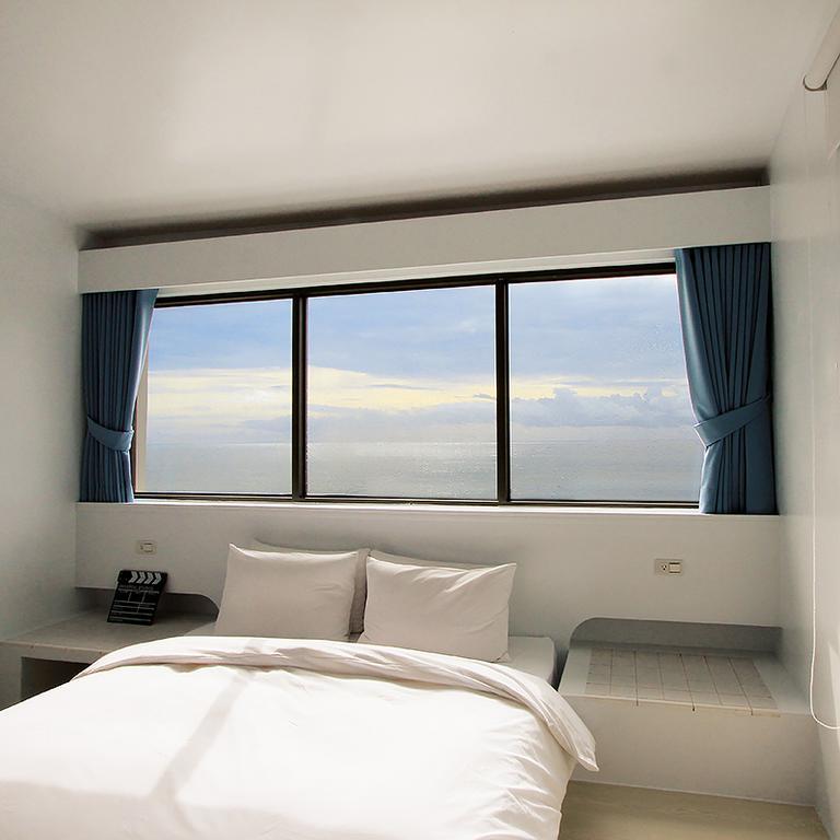 Sea Shore Hotel Manzhou Phòng bức ảnh