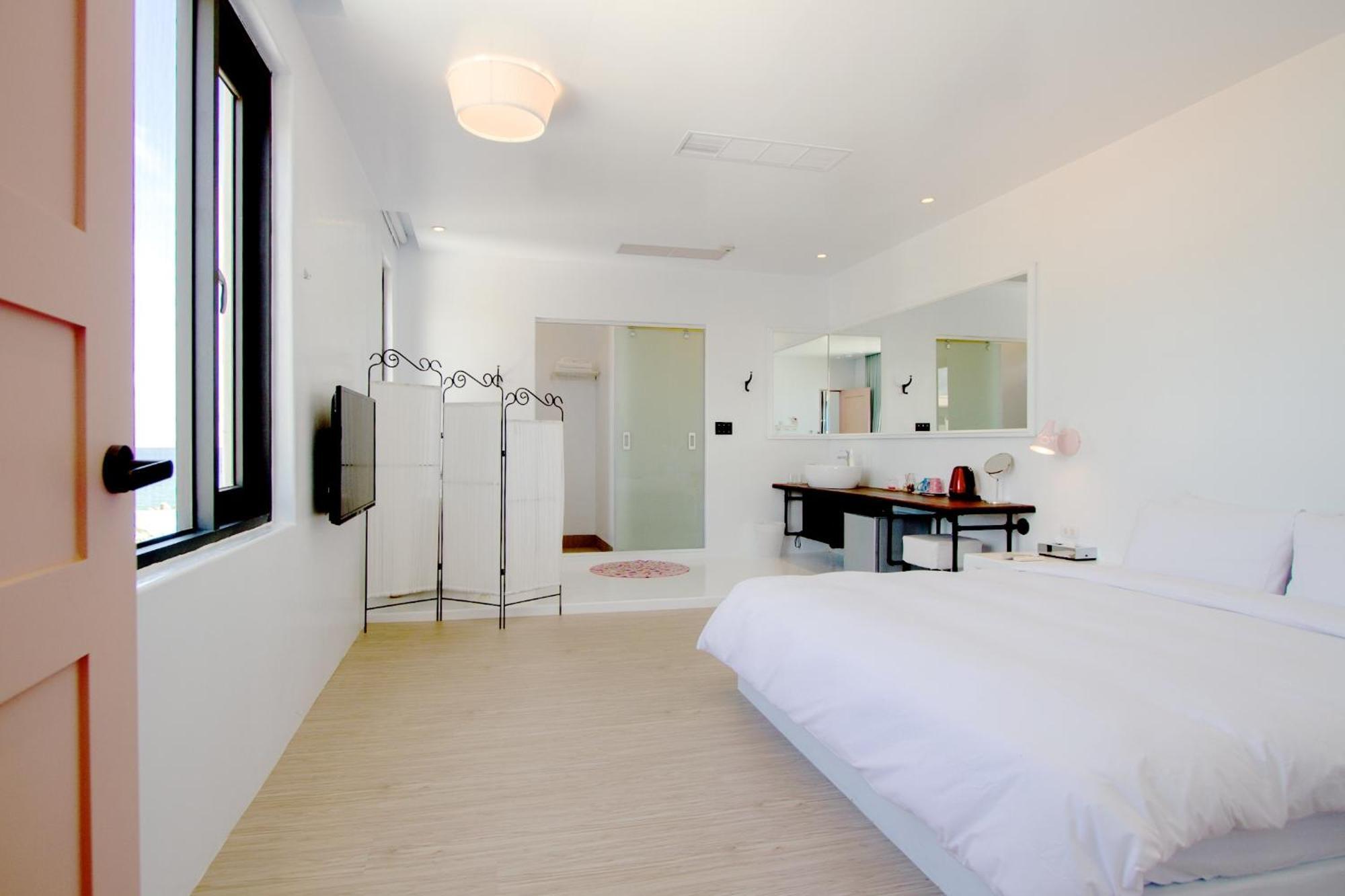 Sea Shore Hotel Manzhou Phòng bức ảnh