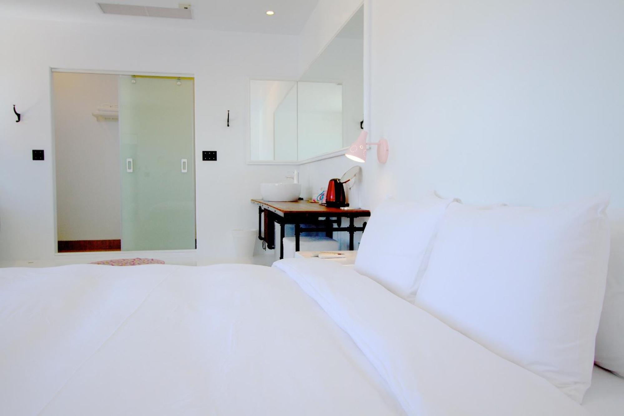 Sea Shore Hotel Manzhou Phòng bức ảnh