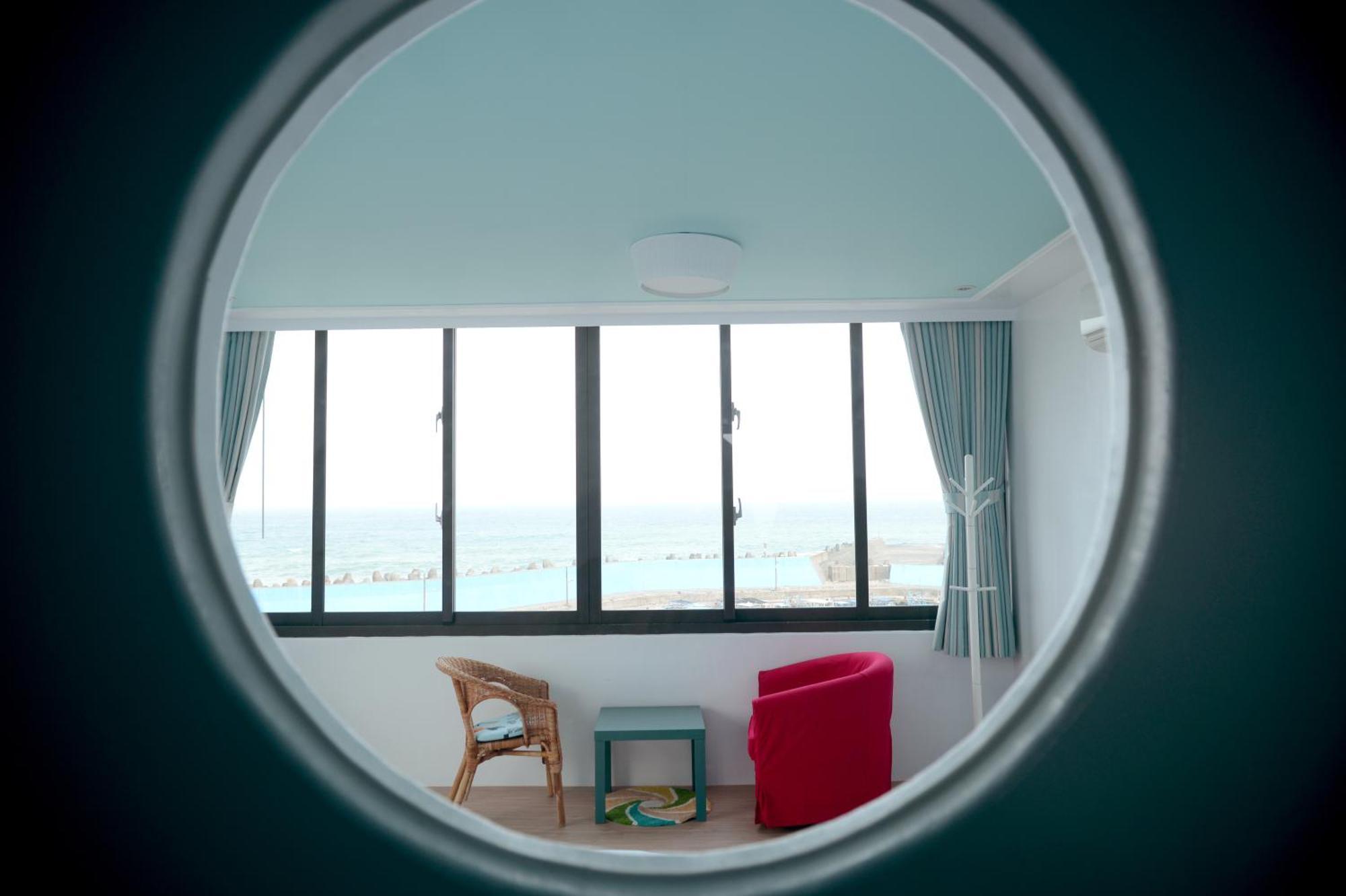 Sea Shore Hotel Manzhou Phòng bức ảnh