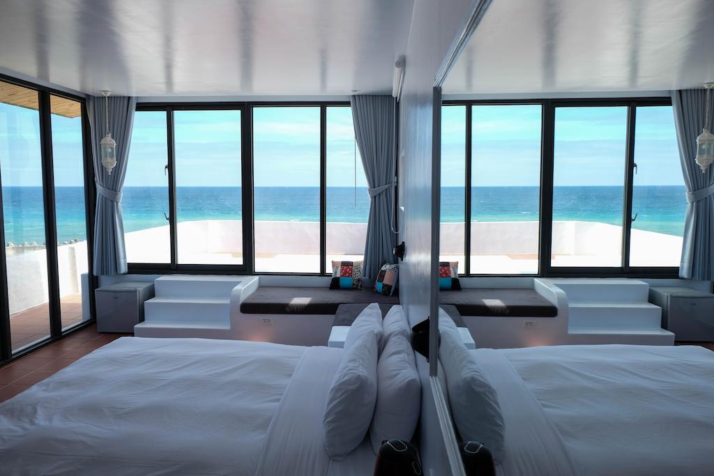 Sea Shore Hotel Manzhou Phòng bức ảnh